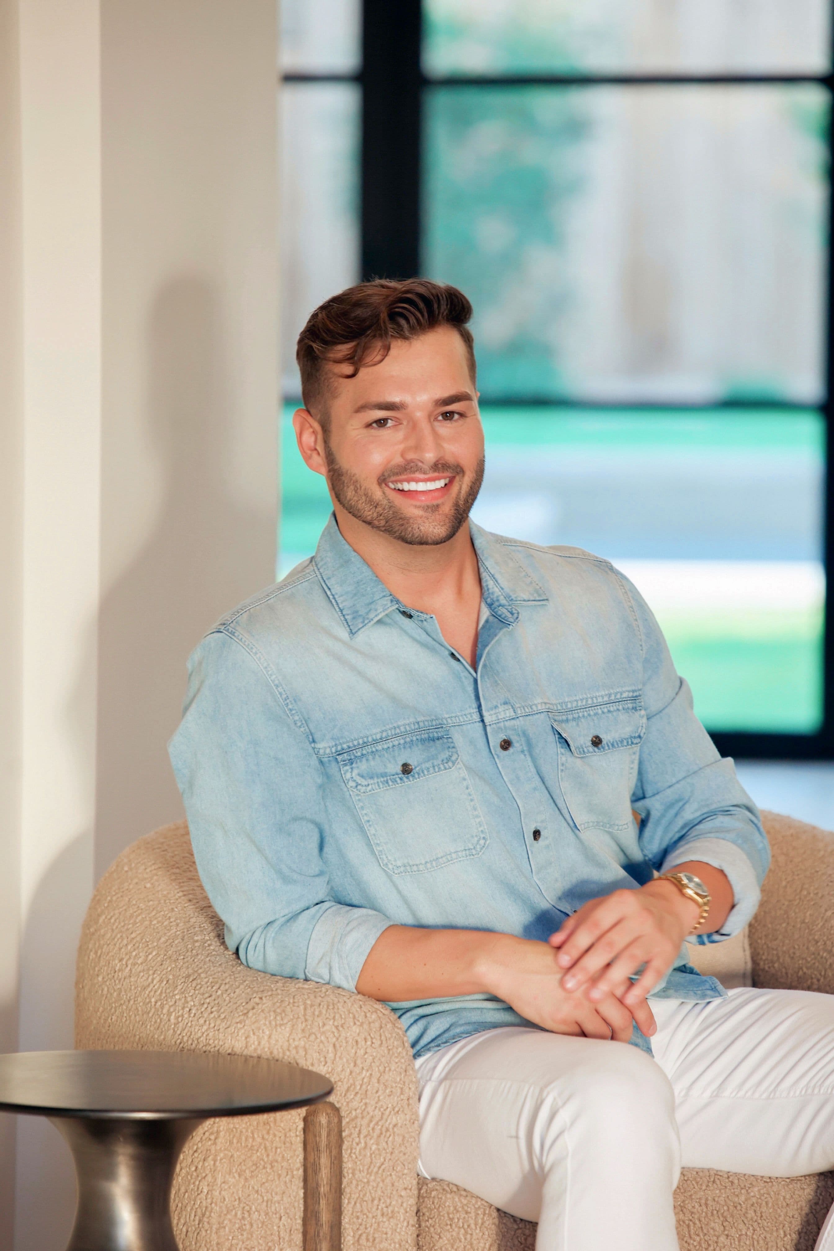 Colton Reid sitting in a chair